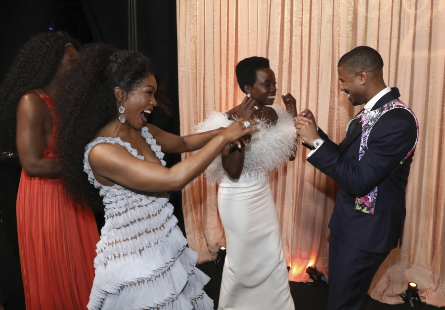 Angela Bassett, from left, Danai Gurira and Michael B. Jordan celebrate “Black Panther” winning the award for outstanding performance by a cast in a motion picture at the 25th annual Screen Actors Guild Awards at the Shrine Auditorium & Expo Hall on Sunday, Jan. 27, 2019, in Los Angeles.