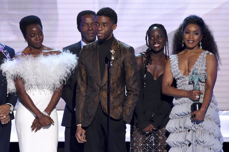 Danai Gurira, from left, Isaach de Bankole, Chadwick Boseman, Lupita Nyong’o and Angela Bassett from the cast of “Black Panther,” accept the award for outstanding performance by a cast in a motion picture at the 25th annual Screen Actors Guild Awards at the Shrine Auditorium & Expo Hall on Sunday, Jan. 27, 2019, in Los Angeles.