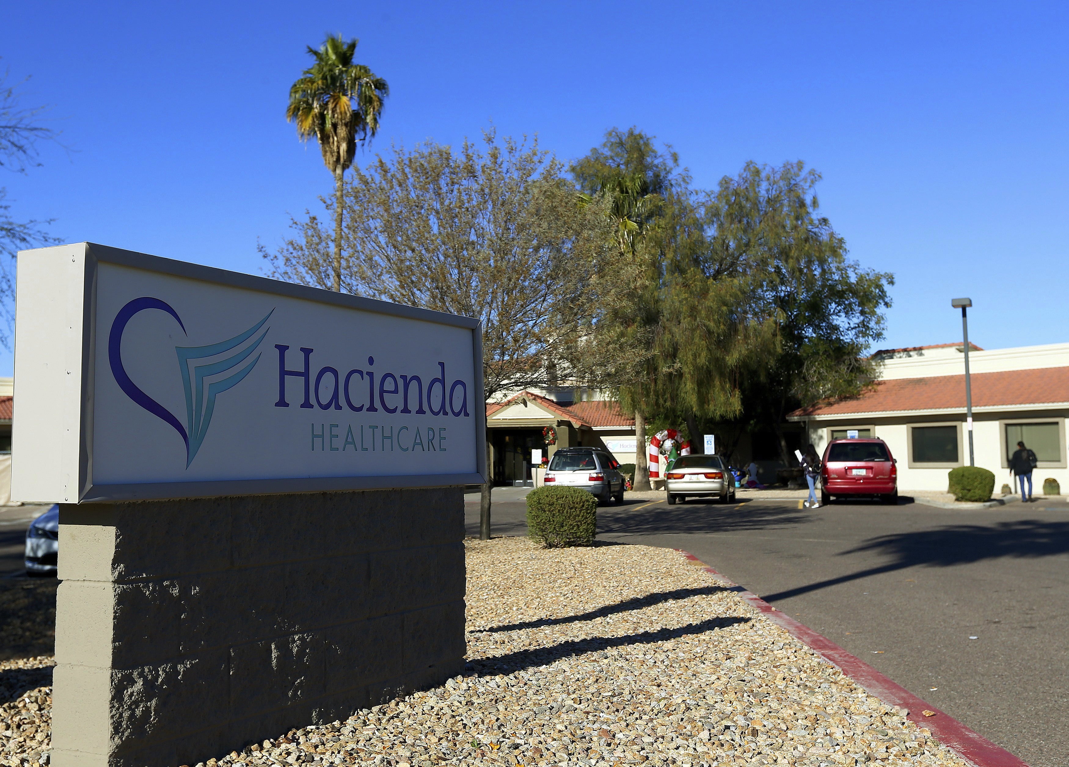 FILE - This Friday, Jan. 4, 2019, file photo shows Hacienda HealthCare in Phoenix. Two doctors who cared for an incapacitated woman who gave birth as a result of a sexual assault are no longer providing medical services at the long-term care center in Phoenix, Hacienda HealthCare said Sunday, Jan. 20. (AP Photo/Ross D.