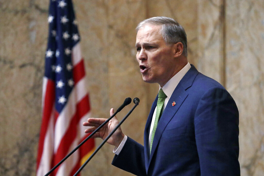 Gov. Jay Inslee speaks during his State of the State address Tuesday, Jan. 15, 2019, in Olympia, Wash. Inslee, who is mulling a 2020 White House bid, highlighted his clean energy agenda in the annual speech.