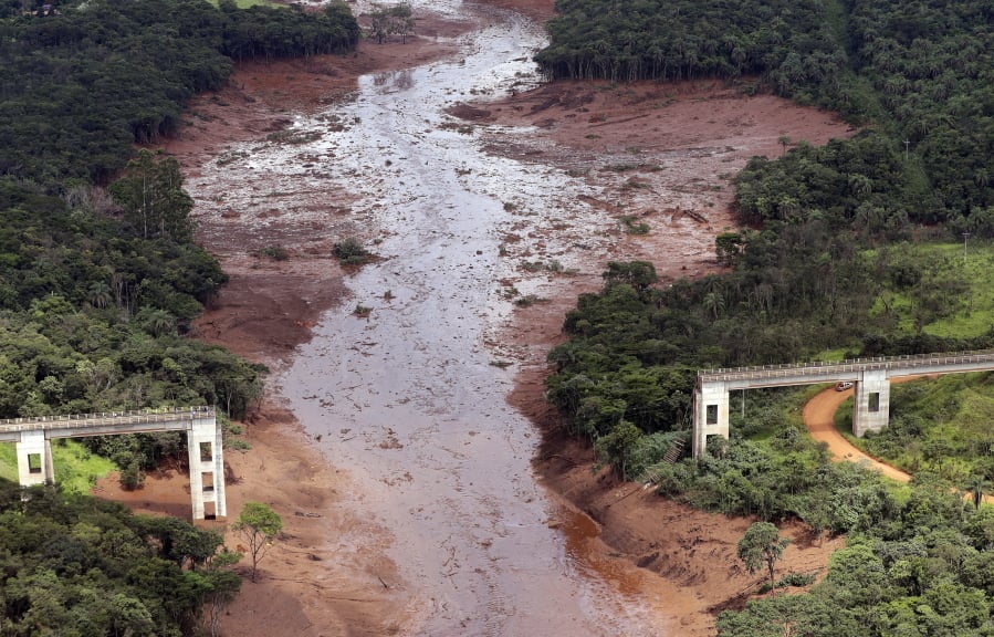 An aerial view shows a destroyed bridget after a dam collapsed in Brumadinho, Brazil, Saturday, Jan. 26, 2019. Rescuers searched for survivors in a huge area in southeastern Brazil buried by mud from the collapse of dam holding back mine waste, with several people dead and hundreds missing.