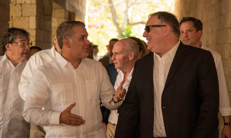 In this photo released by the Colombia’s Presidency U.S. Secretary of State Mike Pompeo, right, and Colombia’s President Ivan Duque talk during a meeting at the Presidential Guest House in Cartagena, Colombia, Wednesday, Jan. 2, 2019.