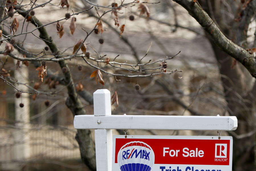 A Realtor sign marks a home for sale on Jan. 3 in Franklin Park, Pa. On Tuesday, the National Association of Realtors reported that home sales fell 6.4 percent in December.