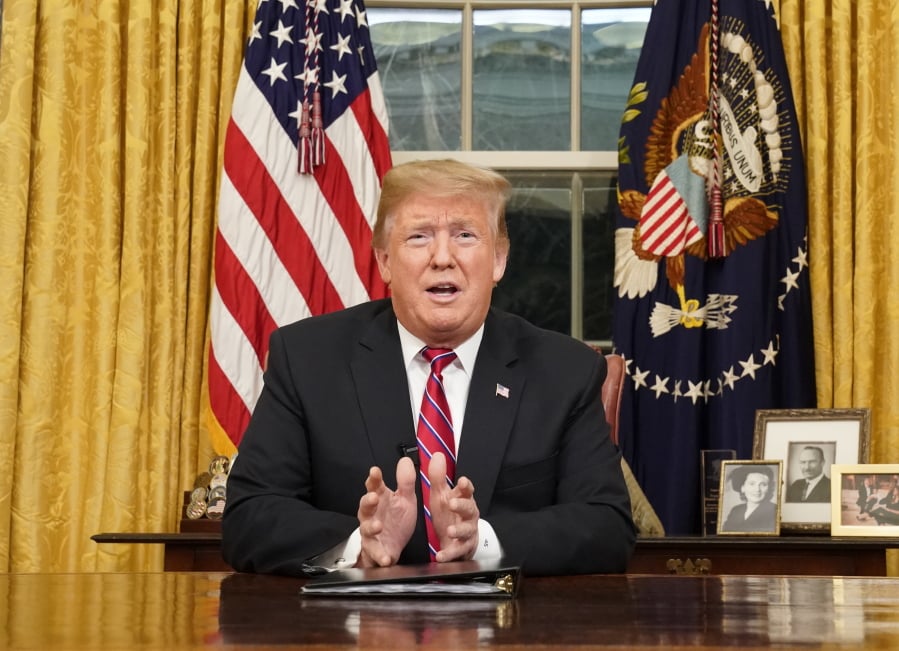 In this Jan. 8, 2019, photo, President Donald Trump speaks from the Oval Office of the White House as he gives a prime-time address about border security in Washington.