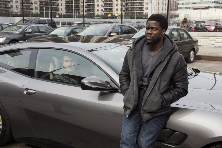 Bryan Cranston, left, and Kevin Hart in a scene from “The Upside.” David Lee/STXfilms