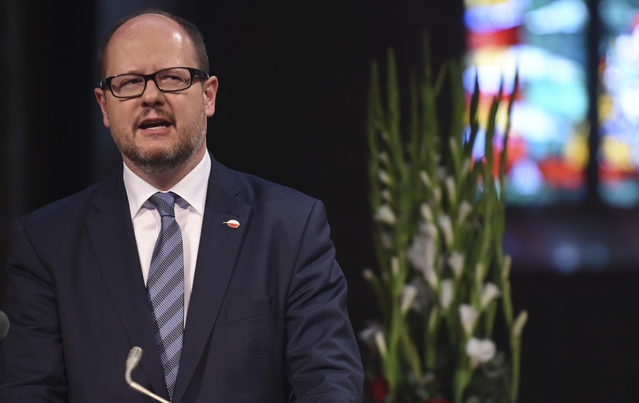 FILE - The May 4, 2016 file photo shows Gdansk mayor Pawel Adamowicz speaking at a commemoration ceremony for late Bremen Mayor Hans Koschnick. Poland’s health minister says that Gdansk Mayor Pawel Adamowicz has died from stab wounds a day after being attacked onstage by an ex-convict at a charity event.
