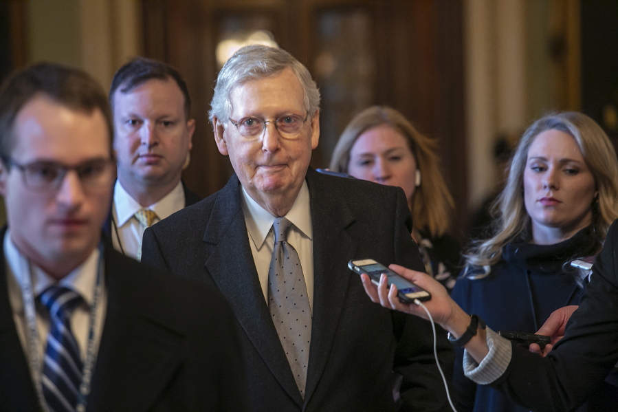 Senate Majority Leader Mitch McConnell, R-Ky., leaves the chamber after speaking about his plan to move a 1,300-page spending measure, which includes $5.7 billion to fund President Donald Trump’s proposed wall along the U.S.-Mexico border, the sticking point in the standoff between Trump and Democrats that has led to a partial government shutdown, at the Capitol in Washington, Tuesday, Jan. 22, 2019. (AP Photo/J.