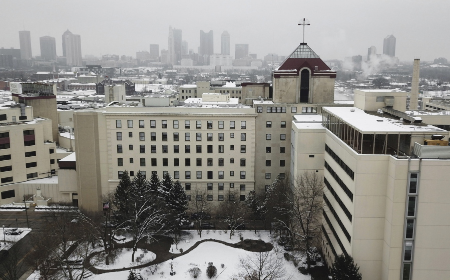 This photo shows Mount Carmel Medical Center, a hospital in the Mount Carmel Health System, in Columbus, Ohio, Tuesday, Jan. 15, 2019. An intensive care doctor ordered “significantly excessive and potentially fatal” doses of pain medicine for at least 27 near-death patients in the past few years after families asked that lifesaving measures be stopped, the Ohio hospital system announced after being sued by a family alleging an improper dose of fentanyl actively hastened the death of one of those patients.