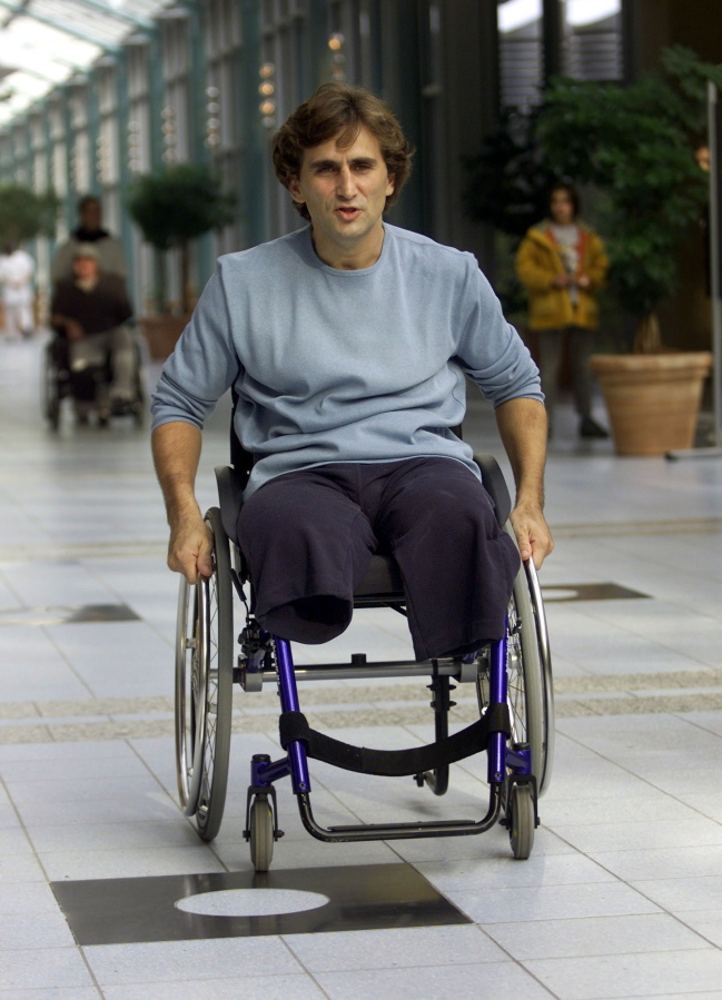 Alex Zanardi proceeds down the aisle of Berlin’s Trauma Center, following a press conference on his recuperation on Oct. 30, 2001. Zanardi lost both legs in an accident at the inaugural American Memorial 500 auto race in Lausitz, Germany. Now 52, Zanardi has seized every moment in the 17 years since and will cross off yet another remarkable achievement this weekend at Daytona International Raceway when he competes in the prestigious Rolex 24 at Daytona endurance race.