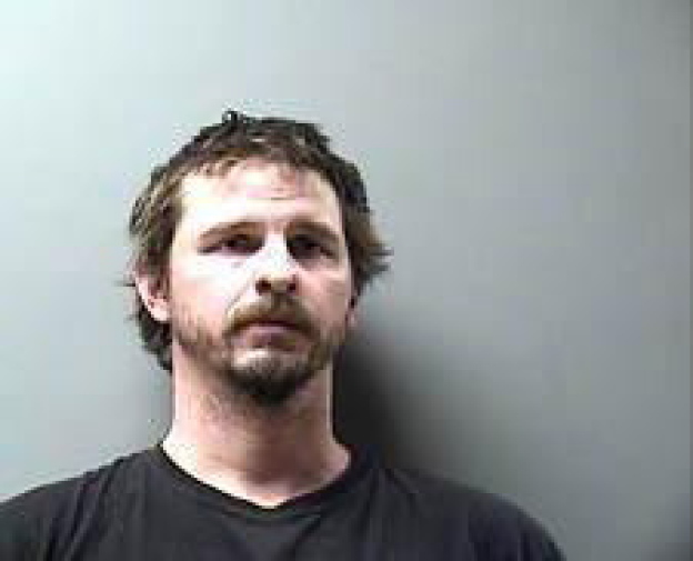 This photo provided by Wapello County Jail in Ottumwa, Iowa shows Lee Ryals. Ryals faces felony charges after officials say he drunkenly fired a rifle from the front deck of a camper hitting a woman in her home. The Iowa Department of Natural Resources says the shooting happened Friday, Jan. 4, 2019 in Wapello County, Iowa.