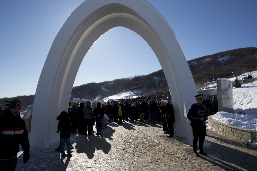 Kosovo Albanians gather to pay their respects to their relatives and victims of the Racak massacre in the village of Racak, Kosovo on Tuesday, Jan. 15, 2019. Kosovo Albanians gathered in the village of Racak on Thursday to mark the 20th anniversary of the massacre of more than 40 ethnic Albanians by Serb security forces.