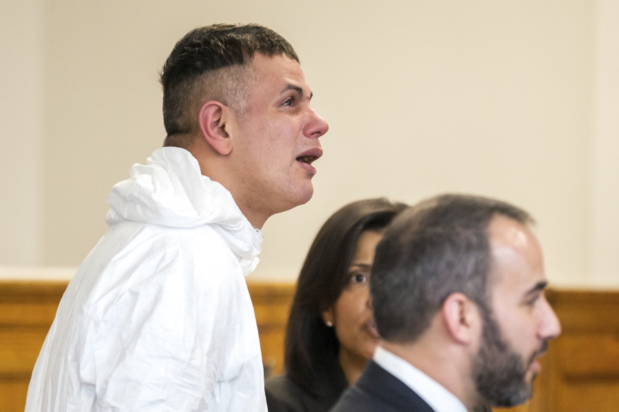 Victor Pena, left, is arraigned on kidnapping charges at the Charlestown Division of the Boston Municipal Court in Charlestown, Mass., Wednesday, Jan. 23, 2019. Pena, who has been charged with kidnapping a 23-year-old woman in Boston has been ordered to undergo a mental health evaluation and will be held without bail.