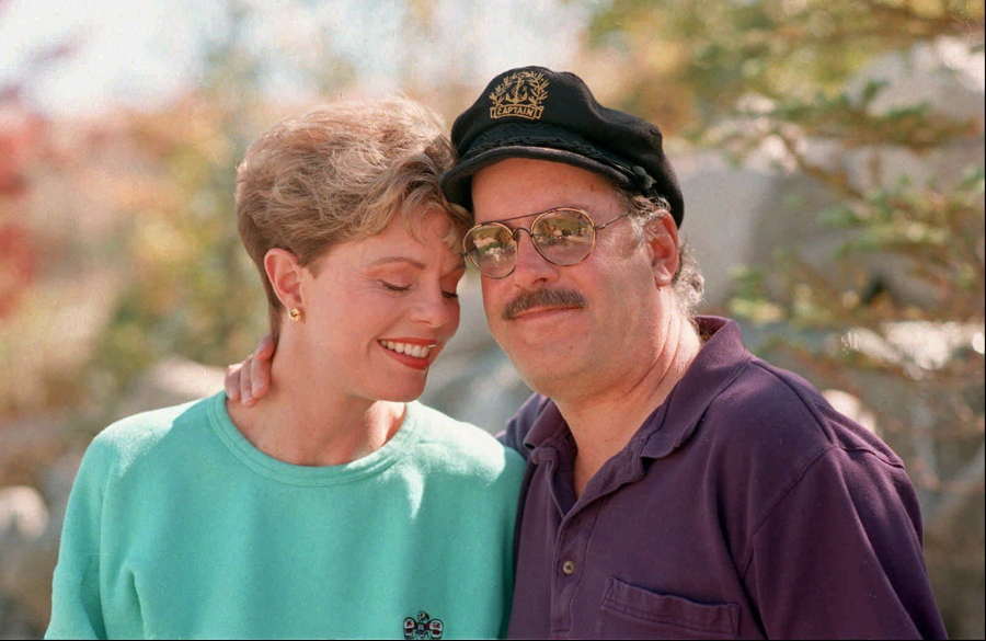 FILE-This Oct. 25, 1995 file photo shows Toni Tennille, left, and Daryl Dragon, the singing duo The Captain and Tennille, posing during an interview in at their home in Washoe Valley, south of Reno, Nev. Dragon died early Wednesday, Jan. 2, 2019 in at a hospice in Prescott, Ariz. Spokesman Harlan Boll said he was 76 and died of renal failure. His former wife and musical partner, Toni Tennille, was by his side. (AP Photo/David B.