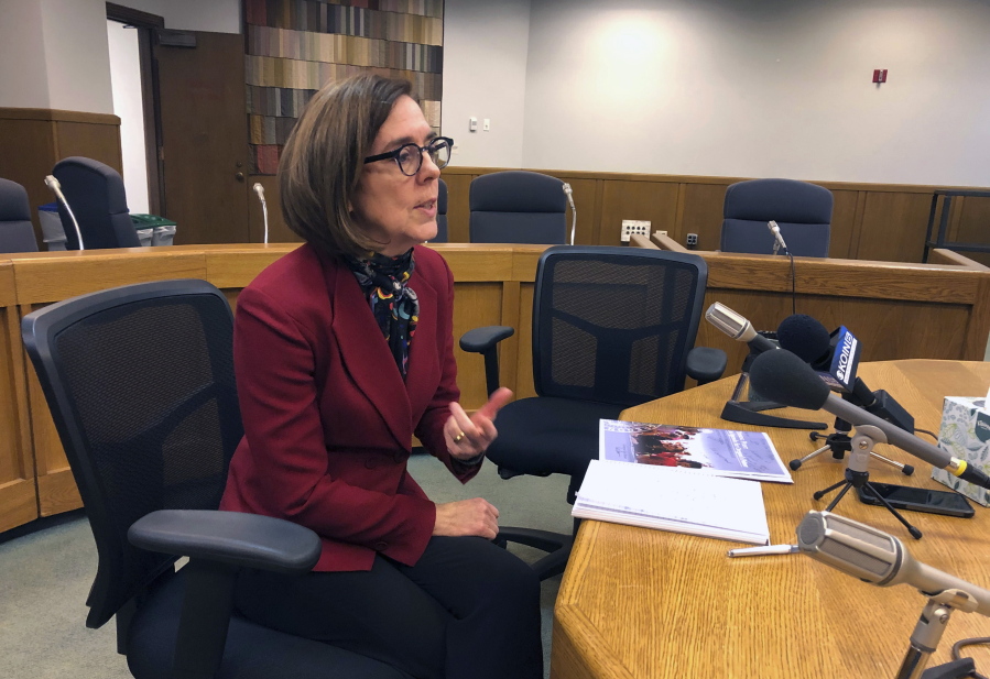 Oregon Gov. Kate Brown speaks at the Associated Press legislative preview, Friday, Jan. 18, 2019 in Salem, Ore.. She said boosting funding for public education is her top priority heading into the 2019 Legislature.