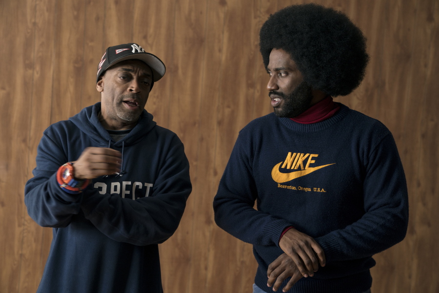 This image released by Focus features shows director Spike Lee, left, and actor John David Washington on the set of “BlacKkKlansma.” Lee was nominated for an Oscar award for best director for his film, “BlacKkKlansman.” The film was also nominated for best picture.