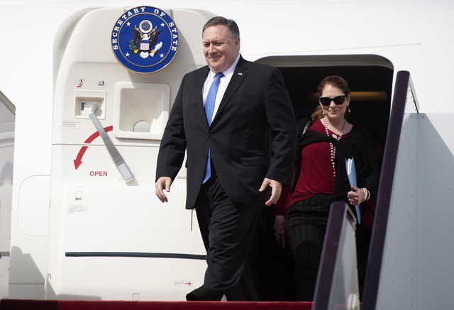 U.S. Secretary of State Mike Pompeo and his wife, Susan arrive to Abu Dhabi International Airport in the United Arab Emirates, Sunday, Jan. 13, 2019.