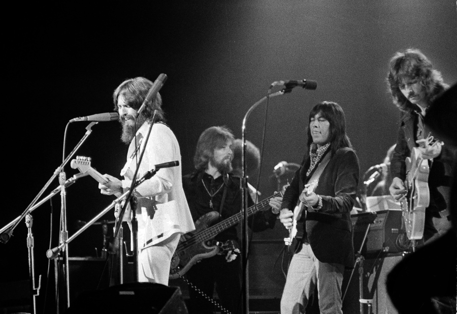 Jesse Ed Davis, center right, a guitarist of Kiowa and Comanche ancestry, performs Aug. 1, 1971, with George Harrison, left, formerly of the Beatles, at the Concert For Bangladesh at Madison Square Garden in New York City.
