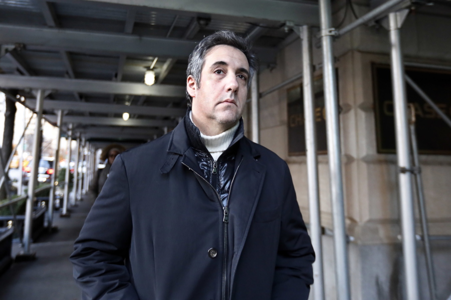 FILE - In this Dec. 7, 2018 file photo, Michael Cohen, former lawyer to President Donald Trump, leaves his apartment building in New York. Cohen is acknowledging that he paid a technology company to falsely improve Trump’s standing in two online polls.