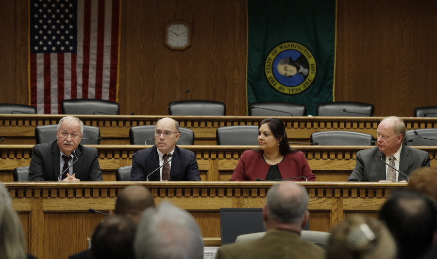 From left, House Speaker Frank Chopp, D-Seattle, Sen. Keith Wagoner, R-Sedro-Woolley, the ranking Republican on the Behavioral Health Subcommittee, Sen. Manka Dhingra, D-Redmond, chairwoman of the Behavioral Health Subcommittee, and Sen. Joe Schmick, R-Colfax, ranking Republican on the House Health Care and Wellness Committee, take part in the Mental Health Reform Panel discussion Thursday during the Associated Press Legislative Preview at the Capitol in Olympia. The Legislature opens the 2019 session on Monday.