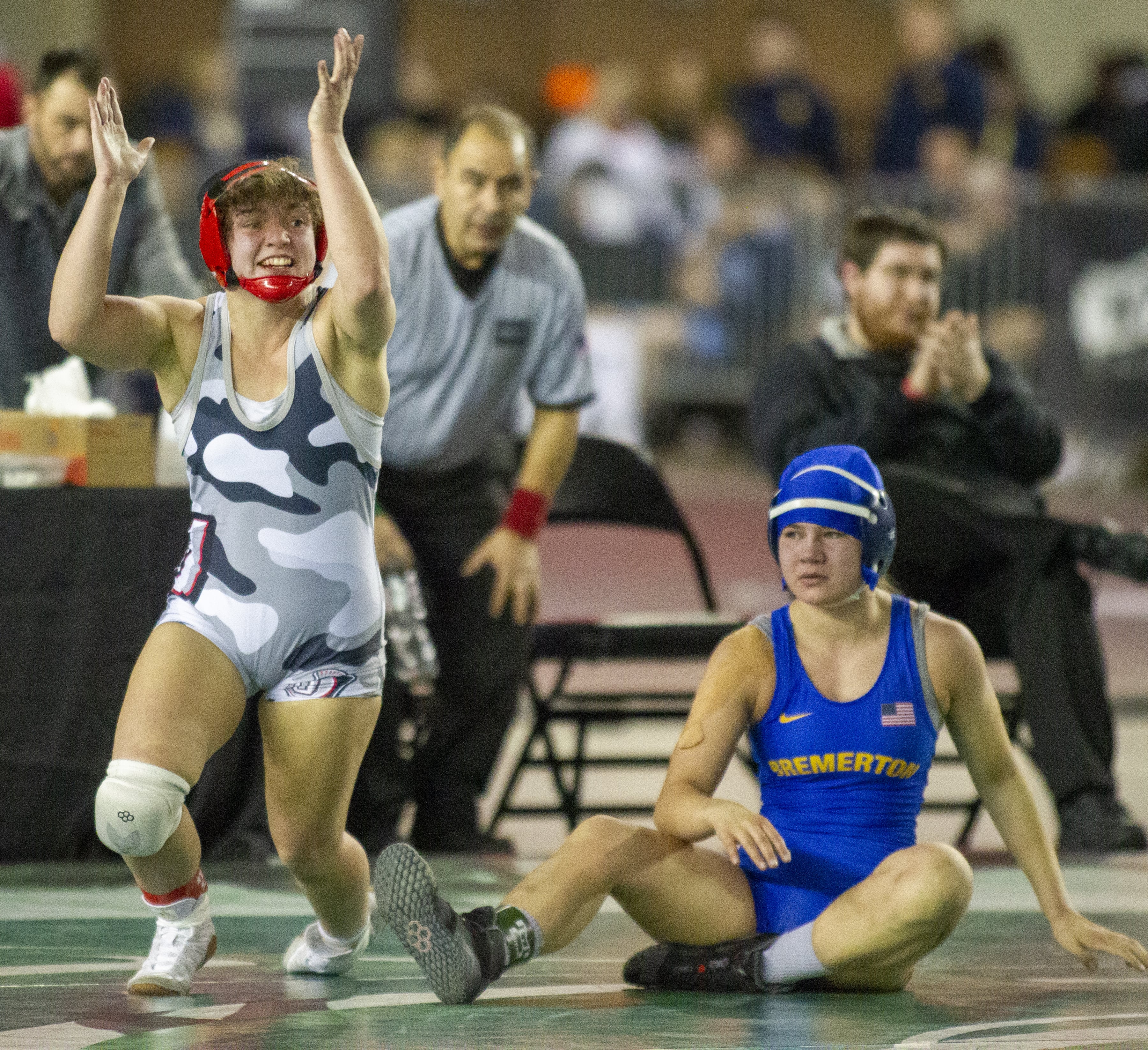 Union's Krista Warren celebrates her 21-1over Bremerton Girls Haley Michaelson, in their Girls 140-pound Championship match on Saturday, February 16, 2019 at the Mat Classic XXXI Championships held in the Tacoma Dome.