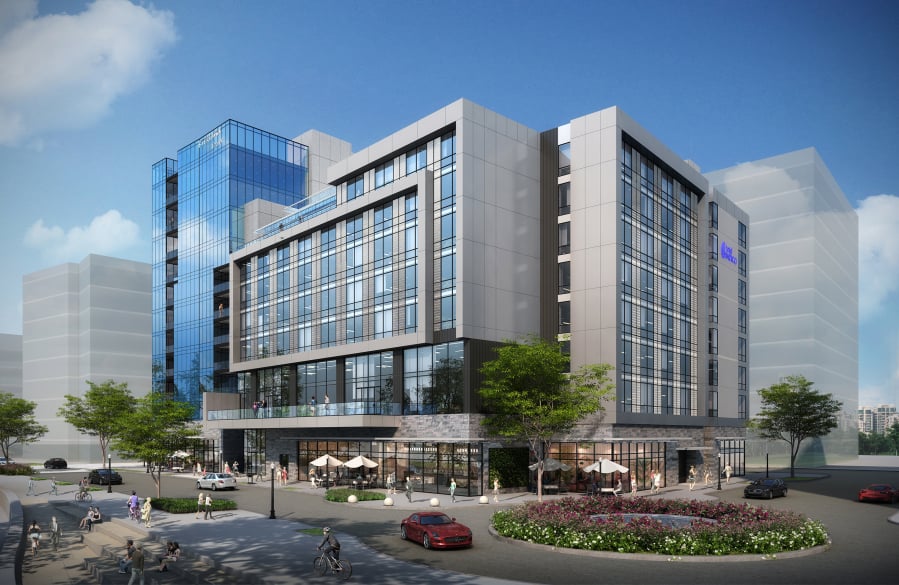 The Hotel Indigo and Kirkland Tower share a foundation and are being built as one project, but will operate as separate buildings. Kirkland Tower condo residents will be able to access the Hotel Indigo lobby to reach retail tenants such as El Gaucho.