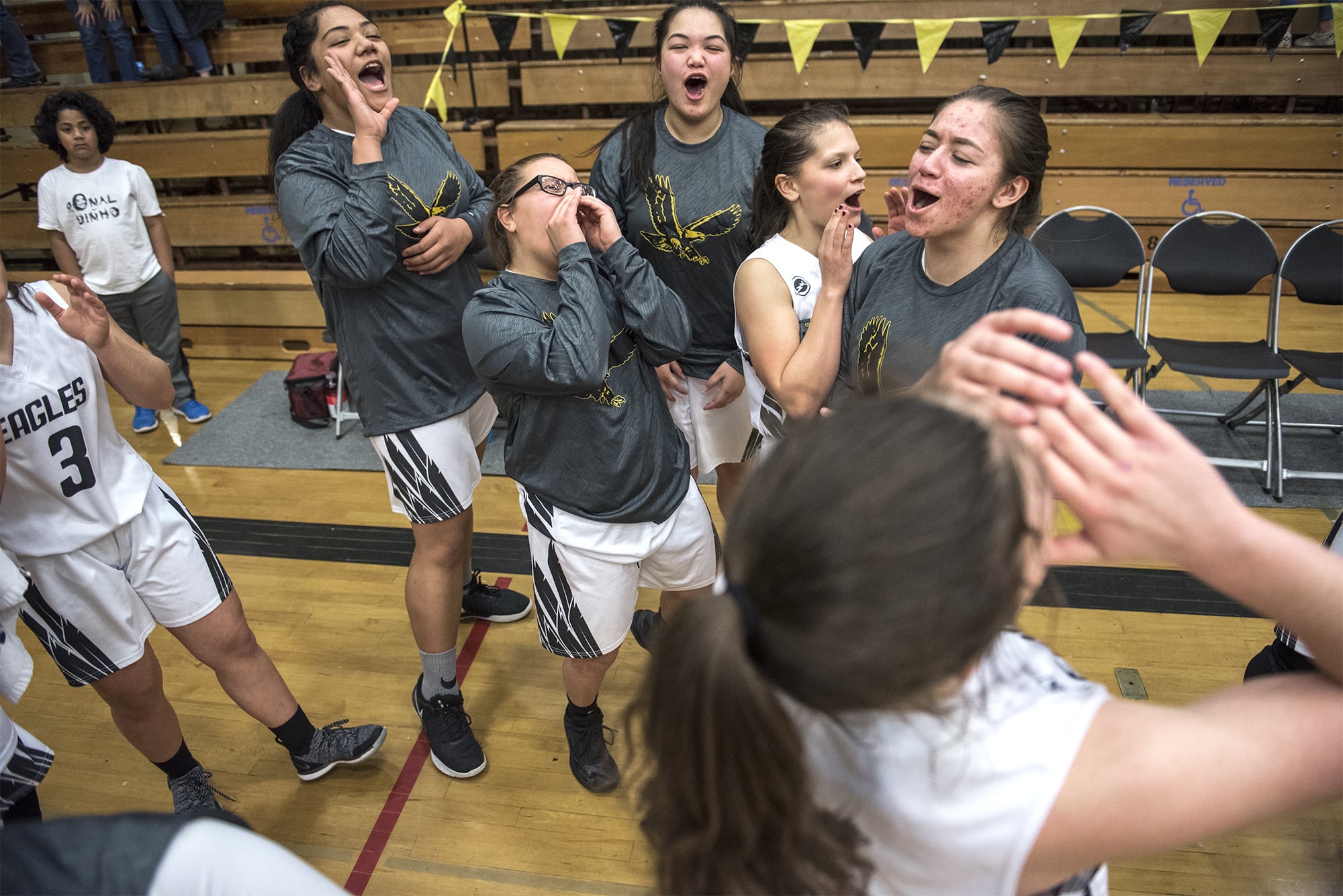 The Hudson's Bay Eagles celebrate their victory over Capital at Hudson's Bay High School on Thursday night, Feb. 7, 2019.