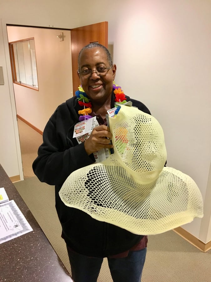 Vancouver resident Mike Woodard poses with a radiation mask he used for cancer treatment. Woodard developed a reputation for looking on the bright side during his fight with cancer of the tonsils.