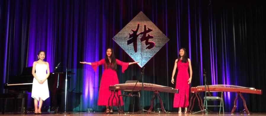 Felida: Yi Shen, center, was the guest of honor at the Vancouver Chinese Association’s new year celebration, and she performed with Jade Young, left, of Grass Valley Elementary School and Joy Young, right, of Skyridge Middle School.