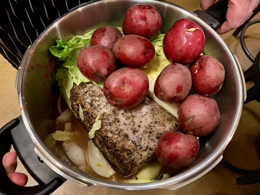 Ingredients for pork pot roast in a pressure cooker.