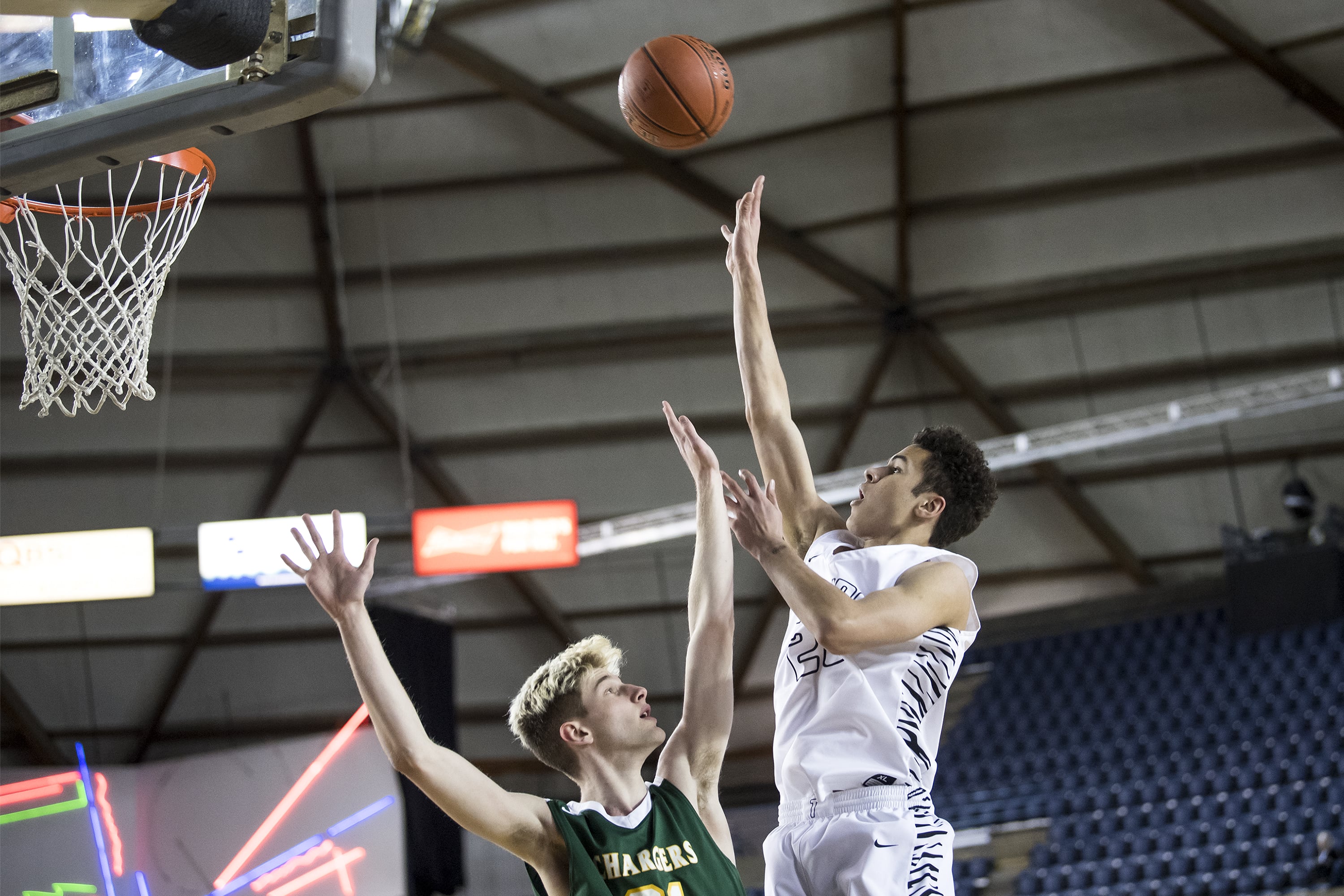Battle Ground's Kaden Perry shoots past a Kentridge defender during the 4A Hardwood Classic at the Tacoma Dome on Wednesday, Feb. 27, 2019.