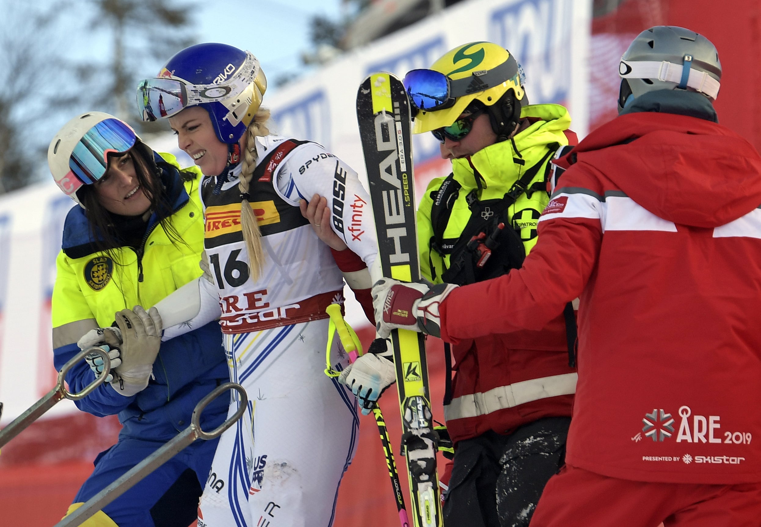 United States' Lindsey Vonn is assisted after crashing during the women's super G at the alpine ski World Championships, in Are, Sweden, Tuesday, Feb. 5, 2019.
