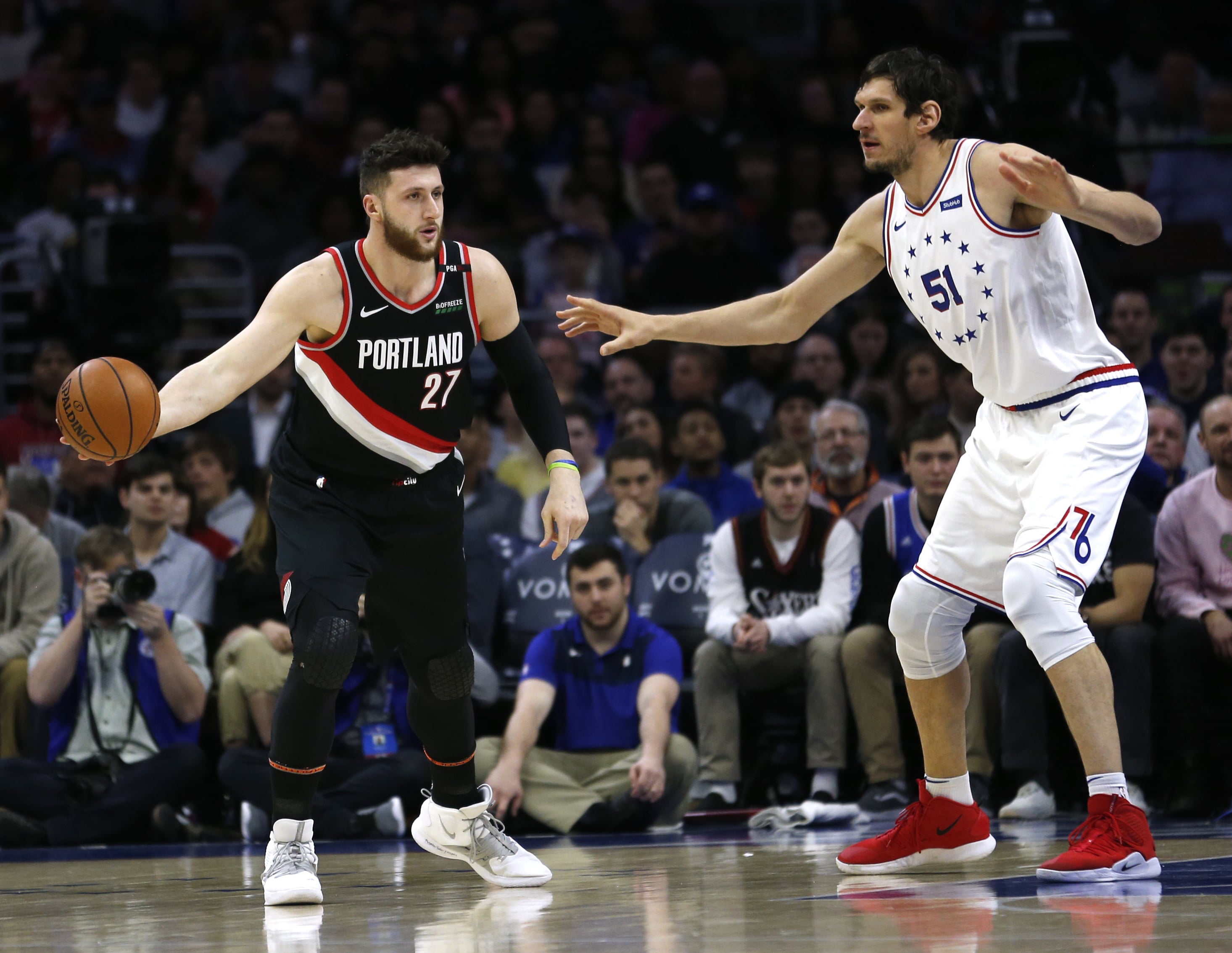 Portland Trail Blazers center Jusuf Nurkic (27) moves the ball around Philadelphia 76ers center Boban Marjanovic (51) during the first half on an NBA basketball game, Saturday, Feb. 23, 2019, in Philadelphia.