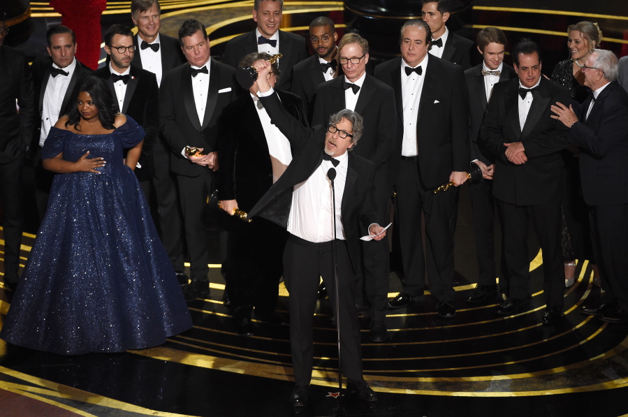 Peter Farrelly, center, and the cast and crew of “Green Book” accept the award for best picture at the Oscars on Sunday, Feb. 24, 2019, at the Dolby Theatre in Los Angeles.