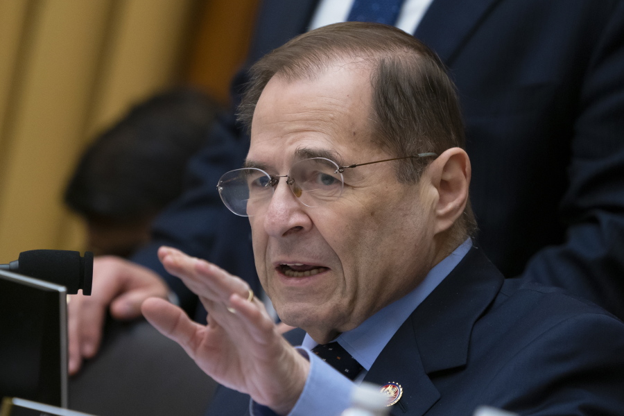 In this Feb. 8, 2019, photo, House Judiciary Committee Chairman Jerrold Nadler, D-N.Y., gestures during questioning of acting Attorney General Matthew Whitaker on Capitol Hill in Washington. A key House committee has approved a bill to require background checks for all sales and transfers of firearms, a first by majority Democrats to tighten gun laws after eight years of Republican rule. (AP Photo/J.