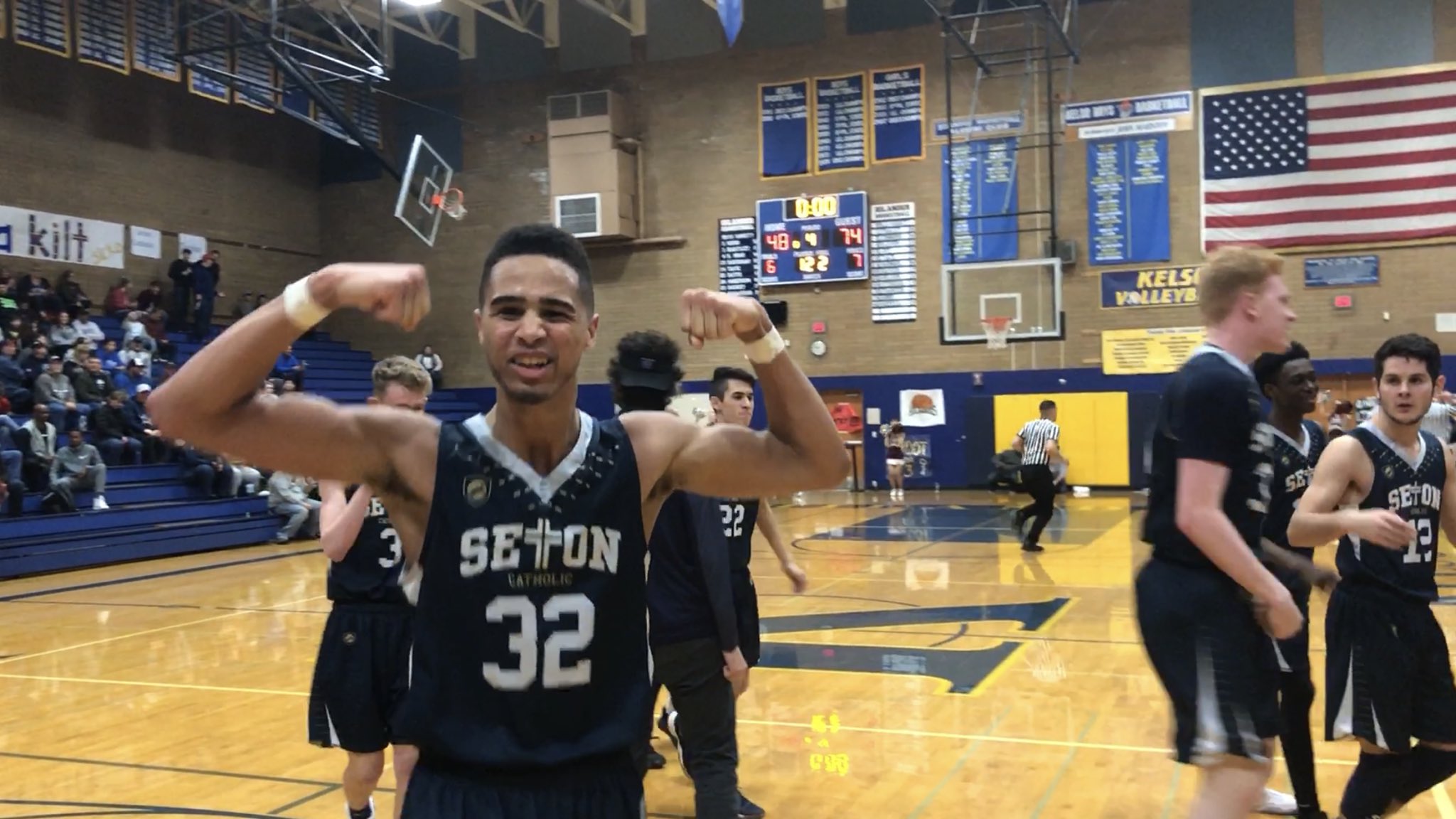 Seton Catholic's Xavian Rushing flexes in the moments after winning a 1A state tournament berth in a rout of Montesano on Saturday.