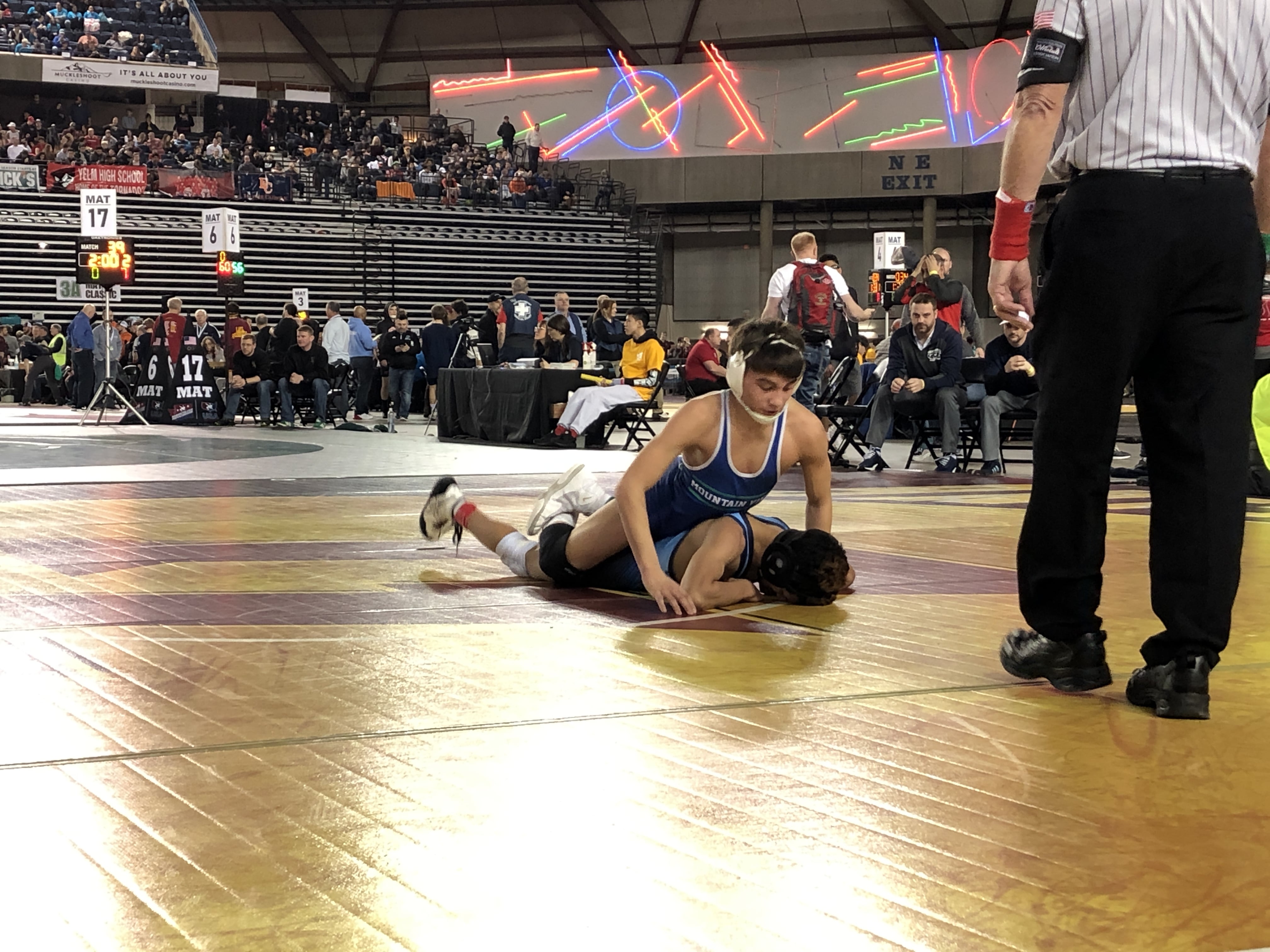 Mountain View's Noah Messman controls his opponent in a first-round match at the Mat Classic state wrestling championships in Tacoma. Messman is one of five Thunder wrestlers to advance to Saturday's quarterfinals.