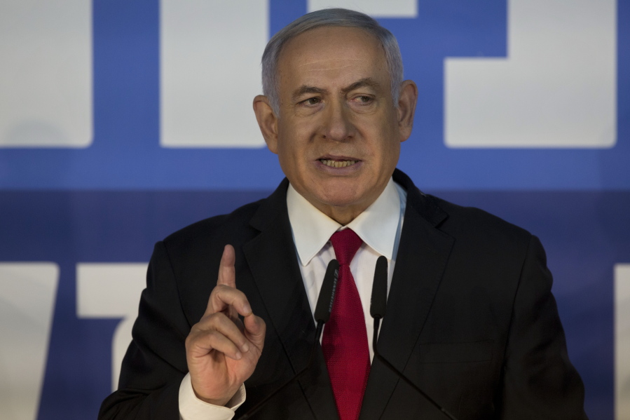 Israeli Prime Minister Benjamin Netanyahu gestures as he delivers a statement at the Prime Minister’s residence in Jerusalem, Thursday, Feb. 28, 2019. Israel’s attorney general on Thursday recommended indicting Prime Minister Benjamin Netanyahu with bribery and breach of trust in a series of corruption cases, a momentous move that shook up Israel’s election campaign and could spell the end of the prime minister’s illustrious political career.