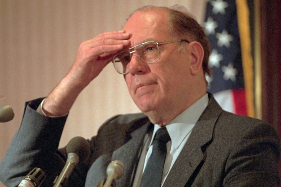 FILE - In this Feb. 3, 1994, file photo, Lyndon LaRouche gestures during a news conference in Arlington, Va..
