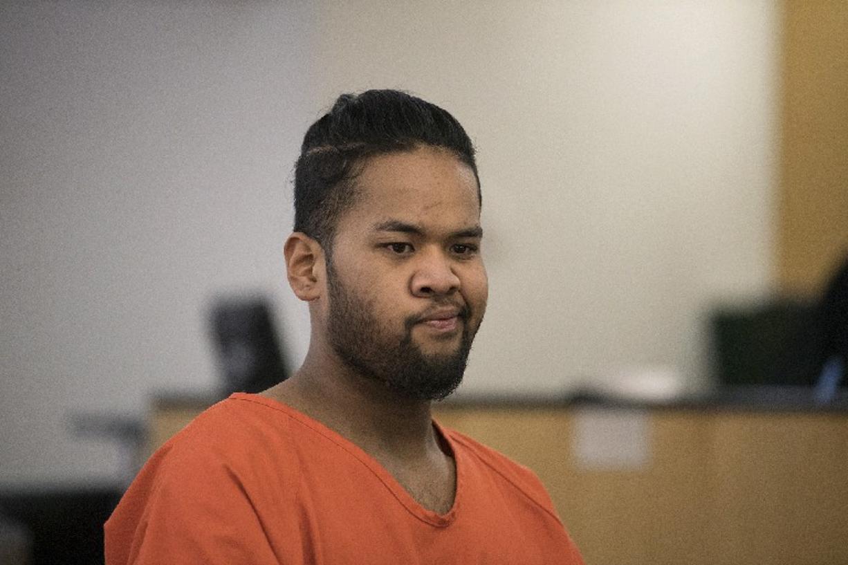 Nenemeny W. Ekiek, 21, suspected in the murder of Kelso convenience store clerk Kayla Chapman, appears in Clark County Superior Court on Tuesday morning. The Clark County case is unrelated to the murder. He allegedly failed to show up for court hearings in a drug case.