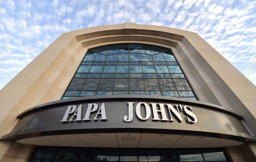 FILE - This July 17, 2018, file photo, shows the corporate headquarters of Papa John’s pizza located on their campus, in Louisville, Ky. Starboard is investing $200 million into Papa John’s and has named its CEO as chairman of the pizza chain. Starboard Value LP said Monday, Feb. 4, 2019, that CEO Jeffrey Smith will serve as chairman of Papa John’s.. (AP Photo/Timothy D.