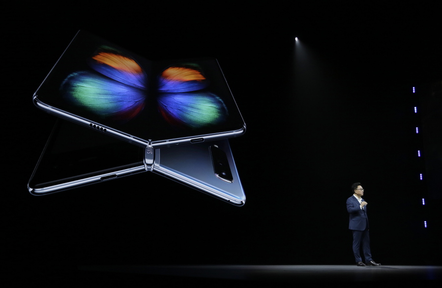 DJ Koh, Samsung President and CEO of IT and Mobile Communications, talks about the new Samsung Galaxy Fold smartphone during an event Wednesday, Feb. 20, 2019, in San Francisco.