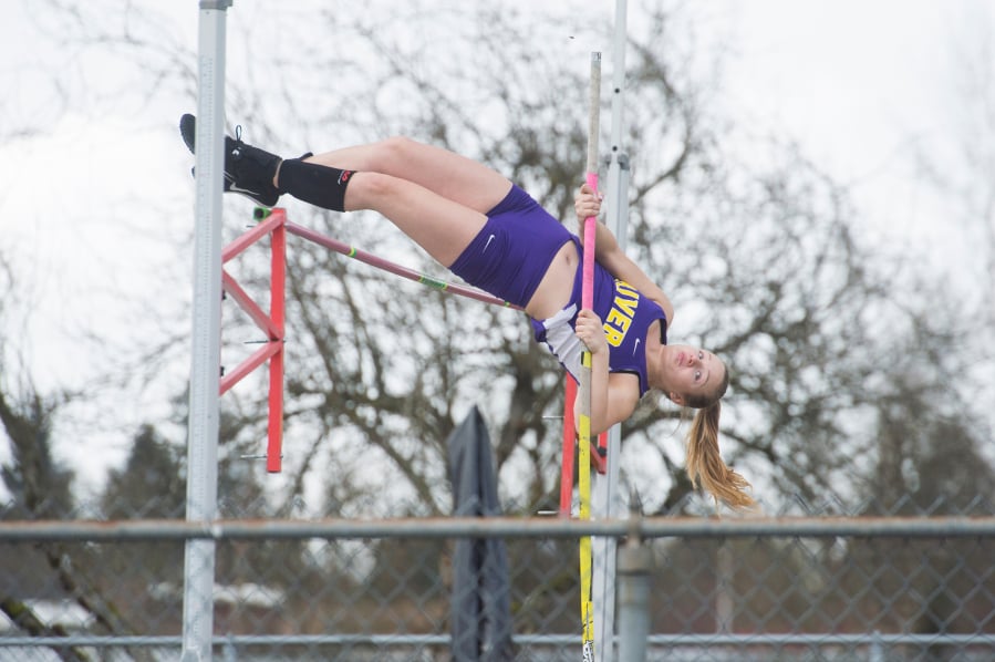 Columbia River’s Grace Gordon clears the bar while competing in the pole vault at the Tiger Invitational on Saturday, March 23, 2019, at Battle Ground High School. She won the event with a vault of 9 feet, 6 inches.