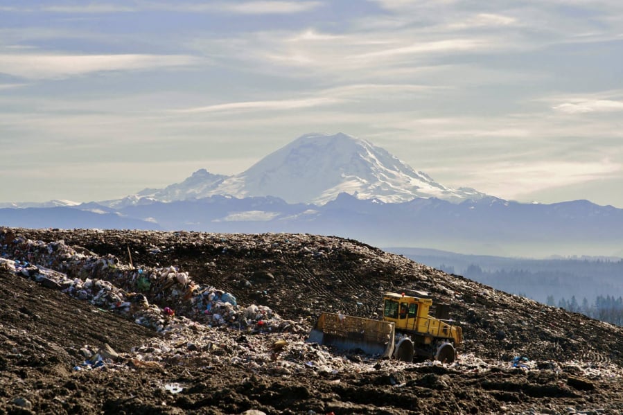 Cedar Hills Regional Landfill, between Renton and Maple Valley, is King County’s only active landfill, where the rubbish produced by more than 1.4 million people is hauled, dumped, compacted and layered into a modest trash mountain lorded over by a fleet of semi-trucks, bulldozers and bald eagles.