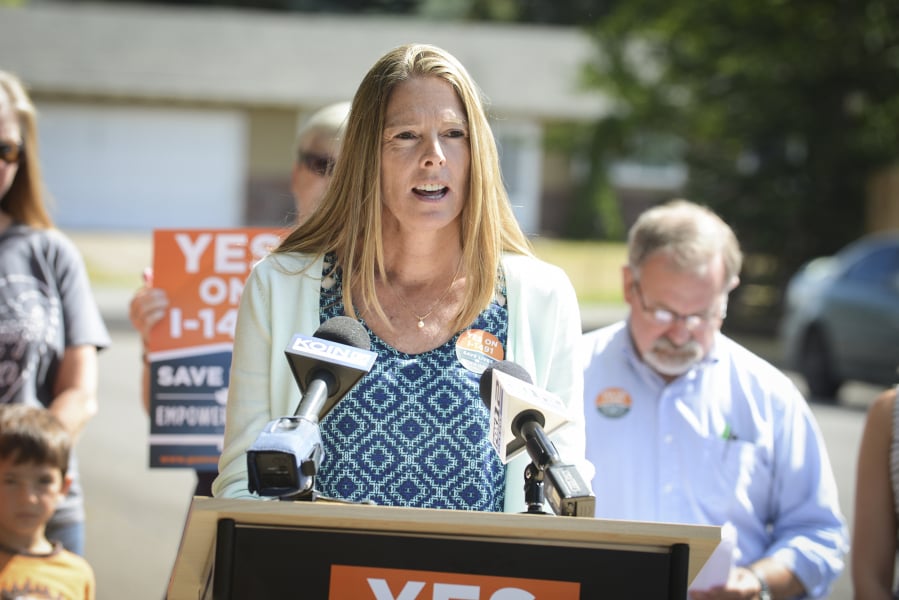 Heidi Yewman, an advocate for reducing gun violence, speaks to media about Initiative 1491 in 2016. More recently, she produced a film about gun violence.