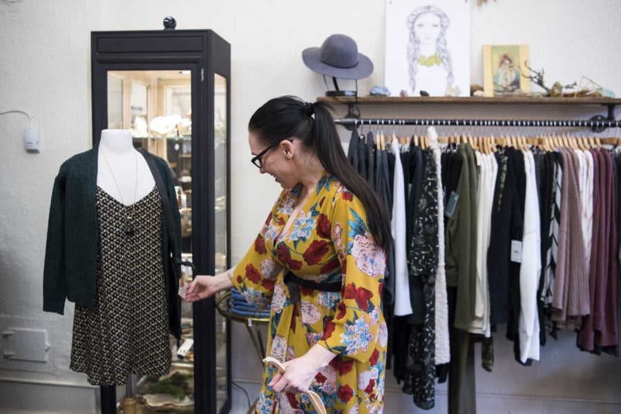 Now that you’ve cleaned out items that didn’t give you joy, it’s time to restock. Natasha Hauskins of Vancouver styles a mannequin at Wild Fern in Vancouver.