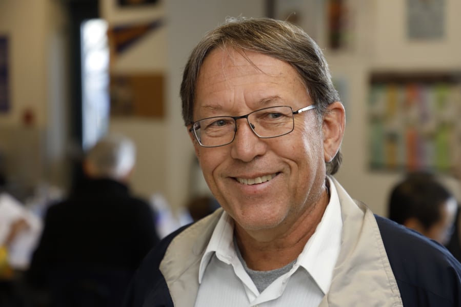 Jeff Genest, a former Skyview science teacher, helped judge Saturday’s science fair.