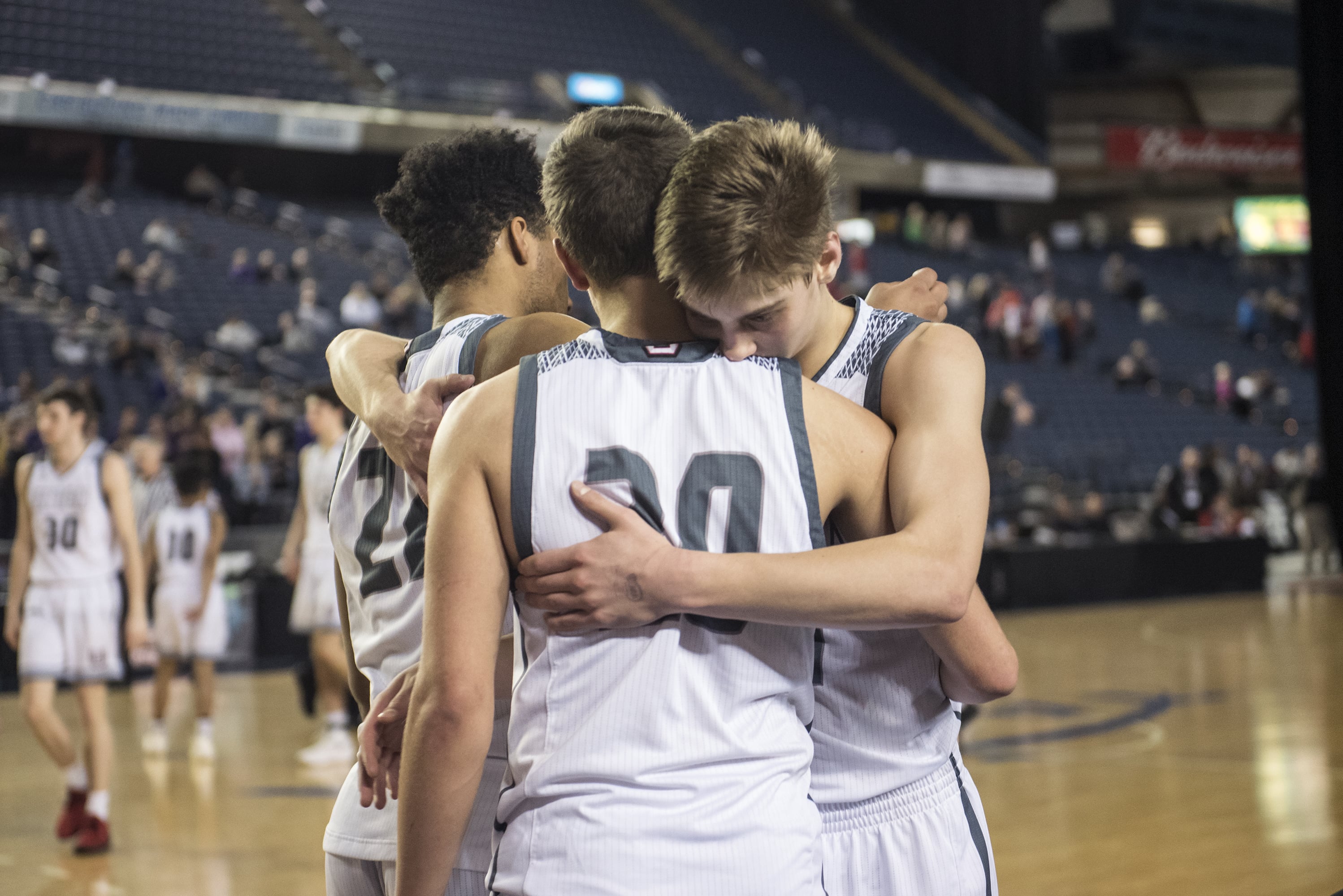 Union reacts to the end of their season following a loss to Puyallup during the 4A Hardwood Classic at the Tacoma Dome on Friday March 1, 2019.