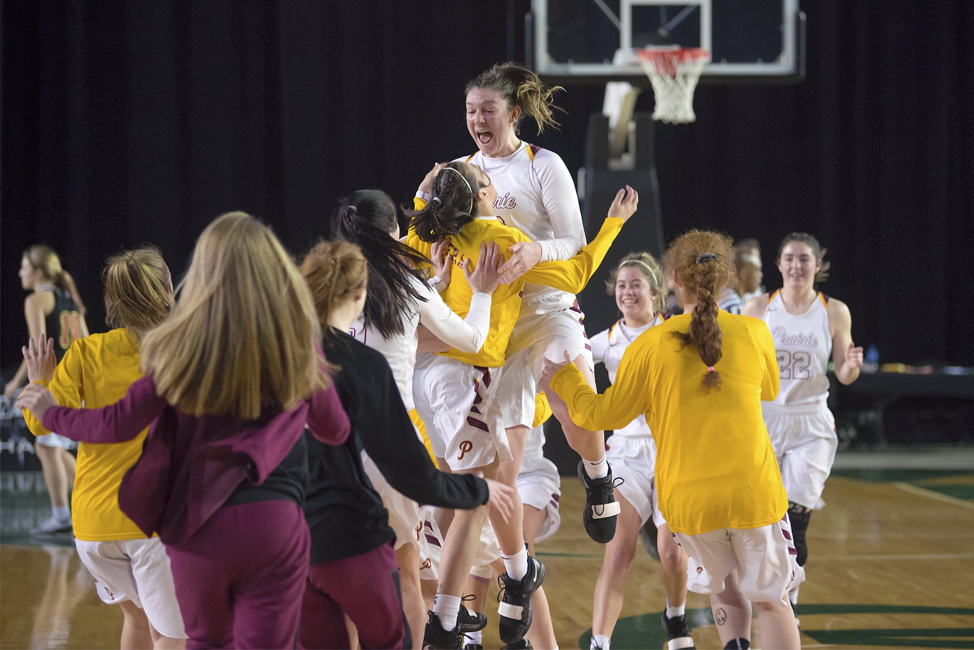 Prairie celebrates their victory over Kamiakin during the 3A Hardwood Classic at the Tacoma Dome on Friday March 1, 2019.