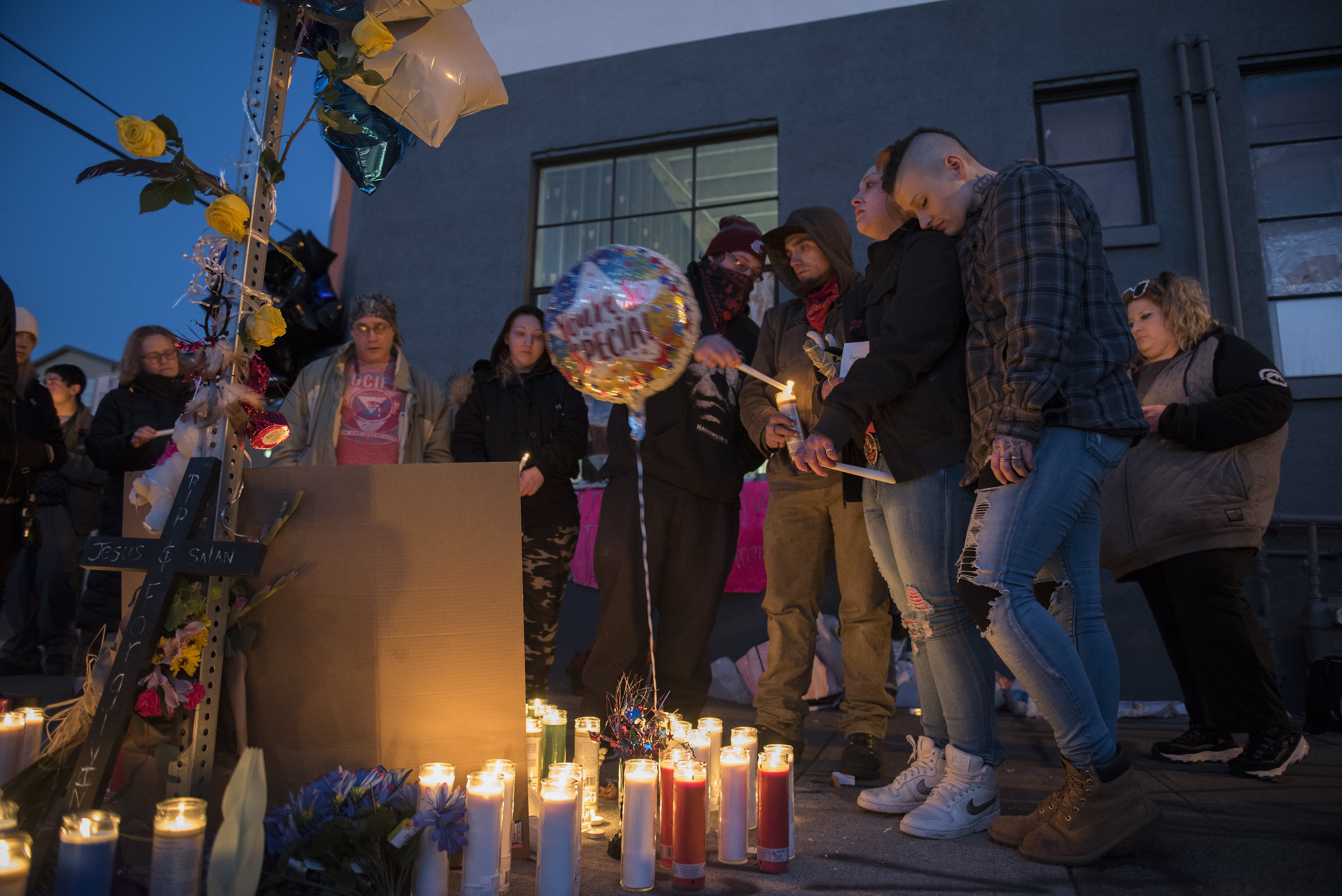 Friends and loved ones of Michael Pierce gather for an emotional candlelight vigil in his memory in downtown Vancouver on Friday evening, March 1, 2019.