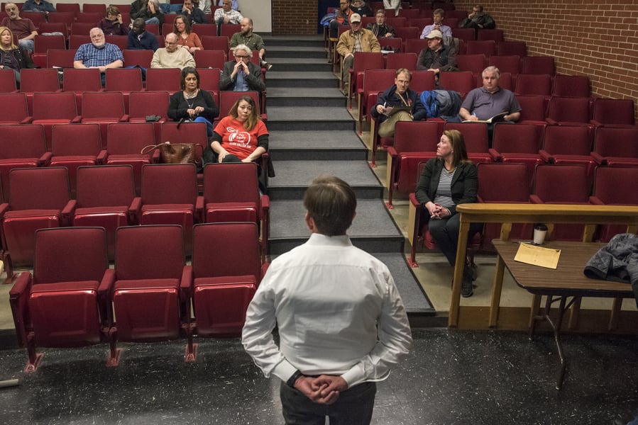 Brett Nair, center, consultant with the Oregon Education Association, speaks during a meeting of Clark College Association for Higher Education members on campus Tuesday afternoon. Nair encouraged members to stand united during ongoing union negotiations.